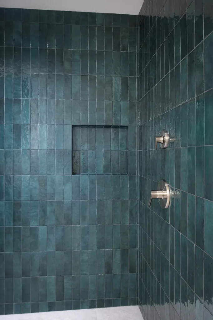 tile shower in newly remodeled bathroom